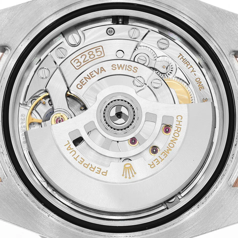 Open caseback showing the Rolex calibre 3285 movement of a GMT-Master II